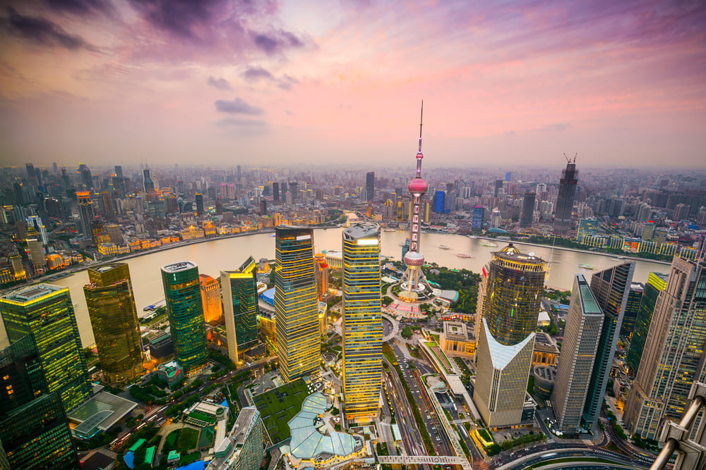 Shanghai, China cityscape overlooking the Financial District and Huangpu River.